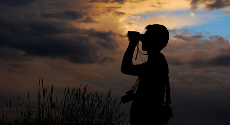 Binoculars at sunset